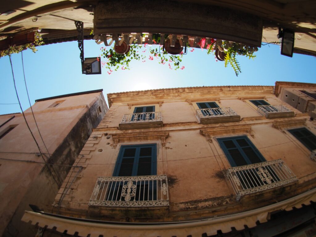 low angle photography of brown building during daytime