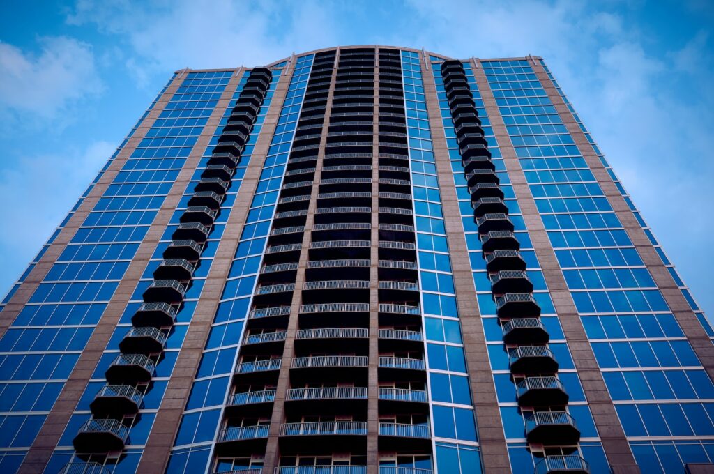 white and blue concrete building under blue sky during daytime